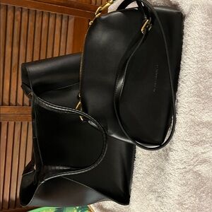 Black purse with matching shoulder bag.